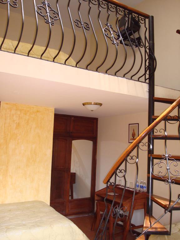 Hotel San Francisco De Кито Номер фото